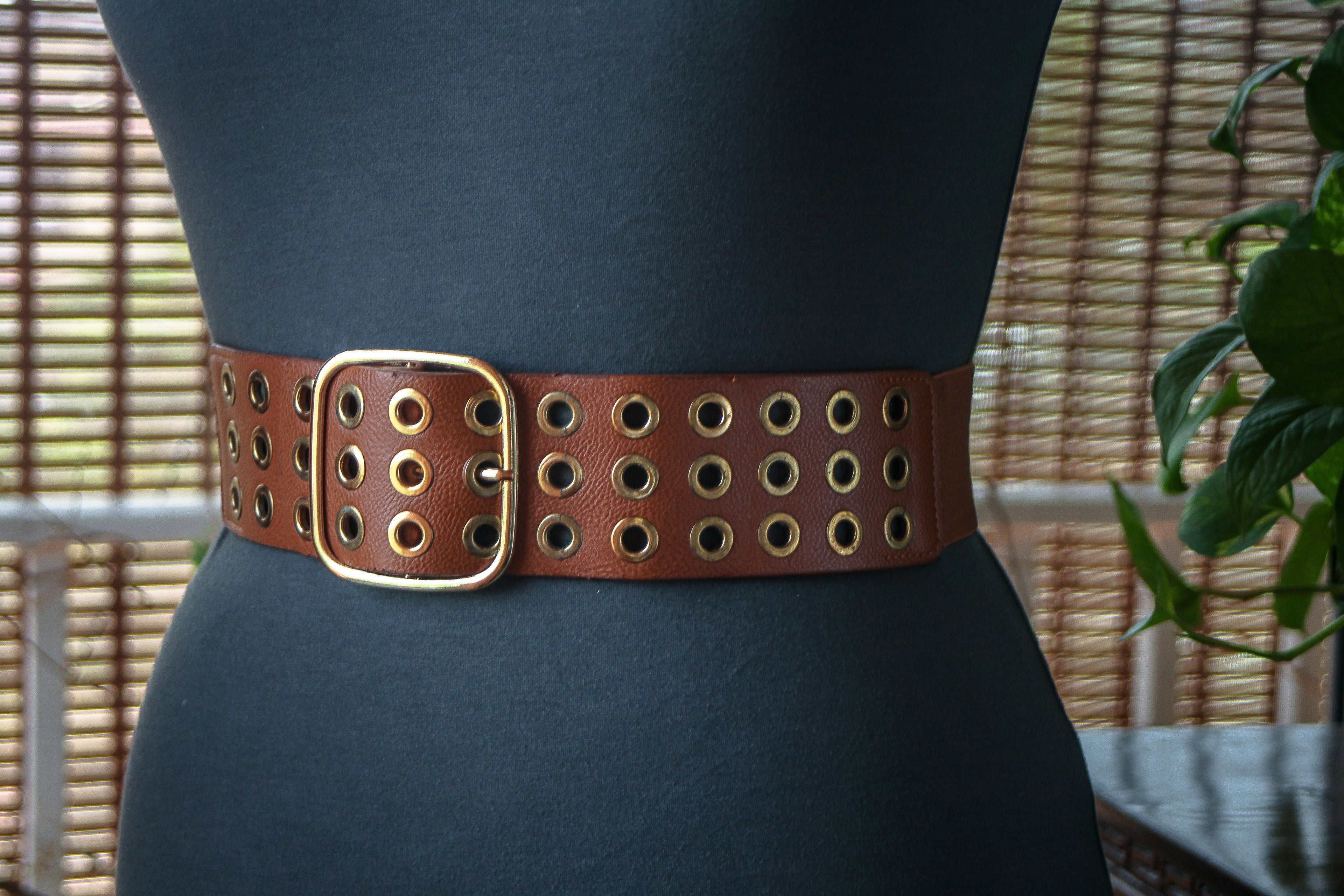 Brown belt, silver metal rivets