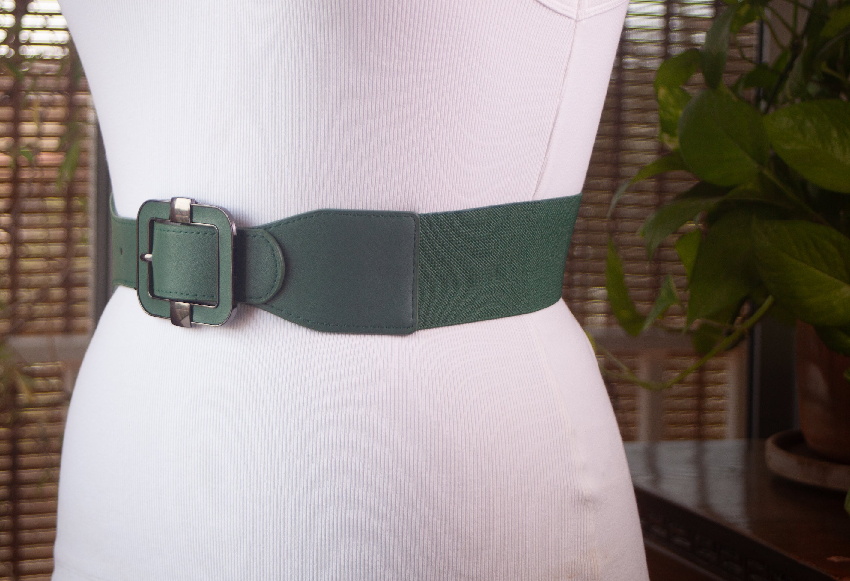 Green Belt with Black Metal Trim on the Buckle