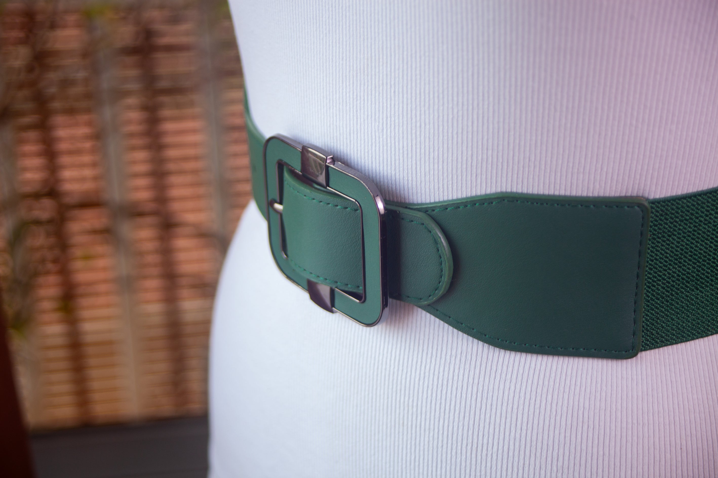 Green Belt with Black Metal Trim on the Buckle